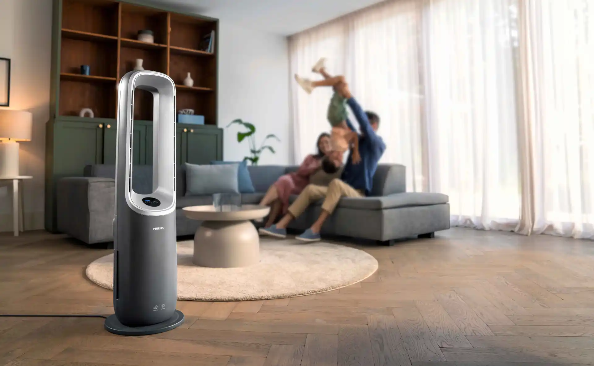 Philips Climate Care gaisa attīrītājs un ventilators ar divtoņu pelēku dizainu un IntensaTech tehnoloģiju, kas nodrošina tīru gaisu komfortablā vidē. Bez lāpstiņām drošībai.