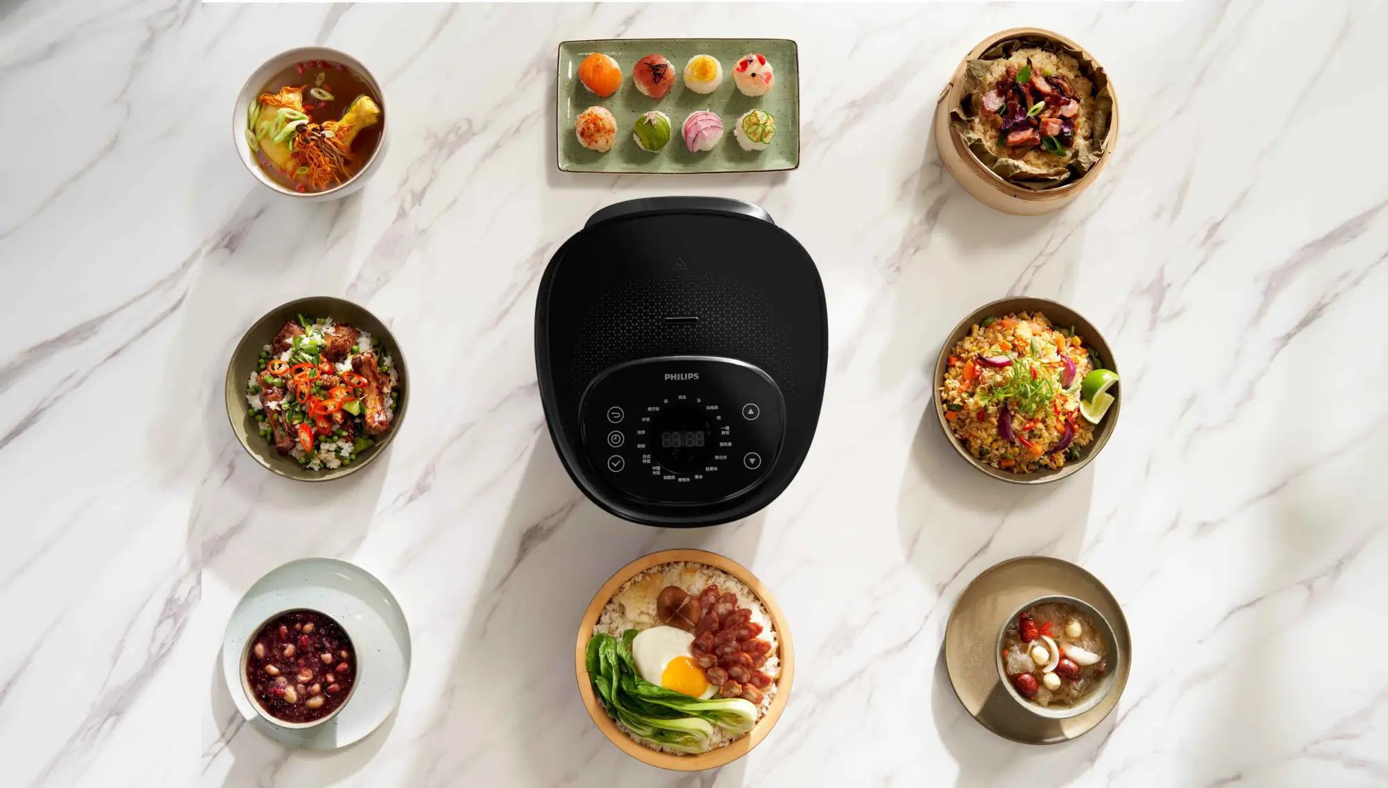 Philips plīts attēls; Melna Philips virtuves plīts, kas attēlota kopā ar gardēžu maltītēm, demonstrē izcilu dizainu un tehnoloģijas, nodrošinot izcilu lietotāja pieredzi.