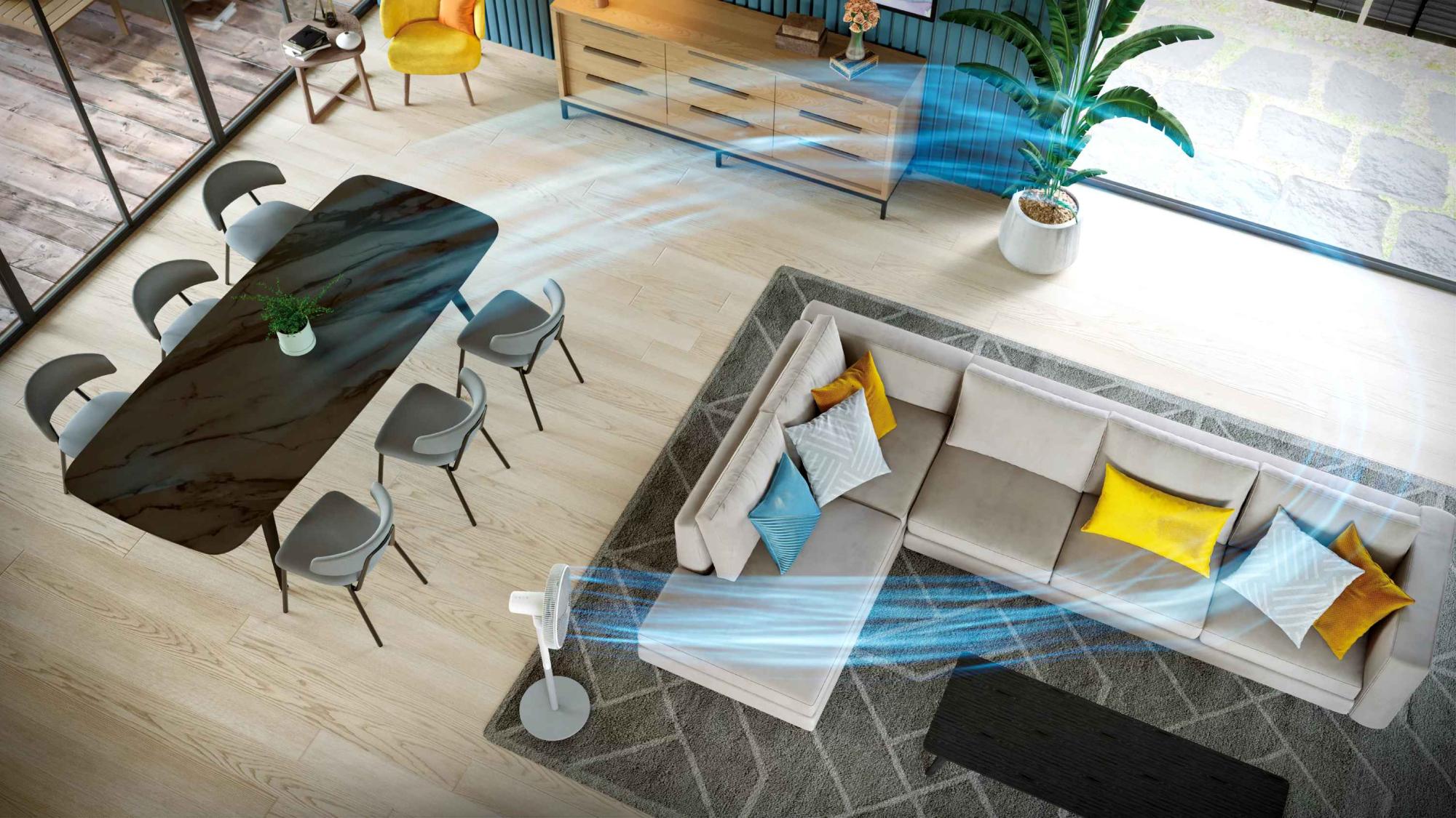 Philips dzesēšanas ventilators: balts pjedestāla ventilators atdzesē modernu dzīvojamo istabu, zilās strūklas izceļ tā jaudīgo gaisa plūsmu.