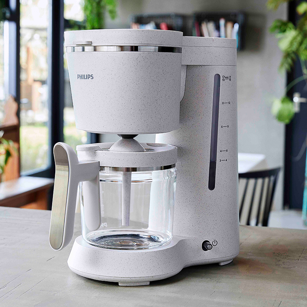 Drip-filter-10-1- Philips Drip filtrkafijas automāts ar raibu apdari un caurspīdīgu karafi, kas paredzēts ērtai lietošanai un izcilai garšai. Pagatavojiet līdz pat 12 tasītēm perfektas kafijas.