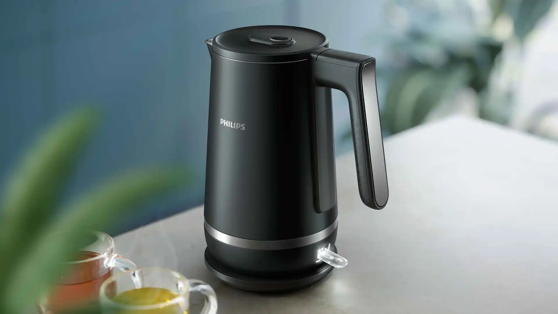 Philips tējkannas: matēti melna tējkanna ar pulētu tēraudu, kas demonstrē izcilu dizainu. Caurspīdīga ieslēgšanas/izslēgšanas slēdža detaļa. Izbaudiet izcilību virtuves tehnoloģijās, lai iegūtu nepārspējamu lietotāja pieredzi.