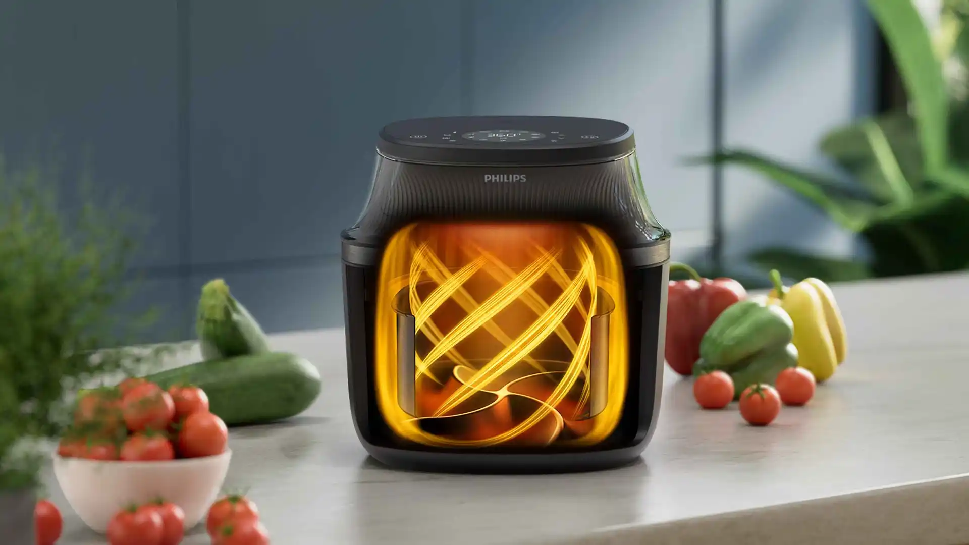 Philips virtuves gaisa fritierim ir izgaismoti gaisa virpuļi iekšpusē, gatavs veselīgu ēdienu pagatavošanai. Aprīkots ar digitālu displeju un elegantu, melnu dizainu. Philips Airfryer.