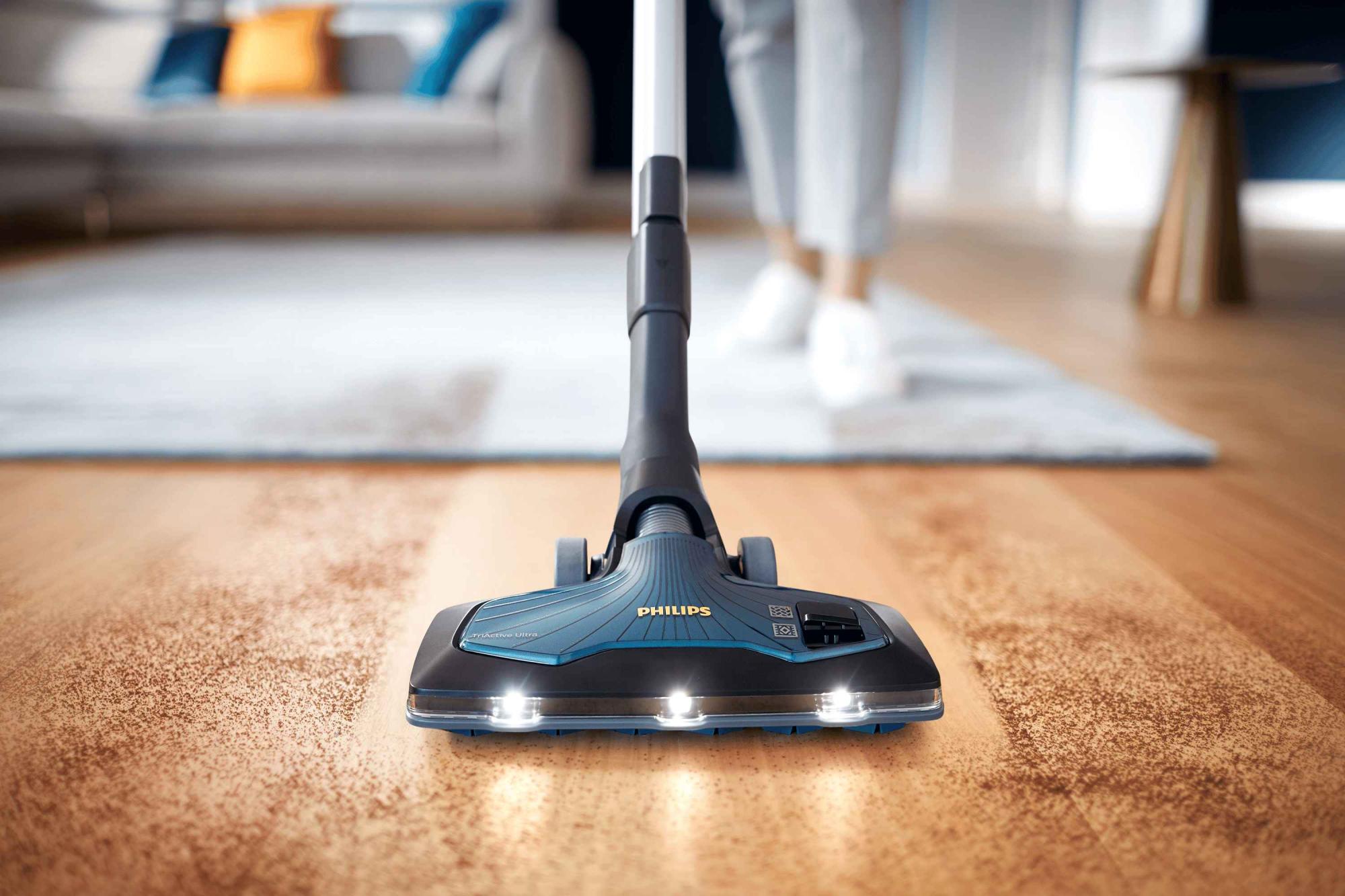 Philips putekļu sūcēji: putekļsūcējs ar apgaismotu galviņu cietu koka grīdu tīrīšanai; tīra trajektorija, moderns dizains nepārspējamai pieredzei.